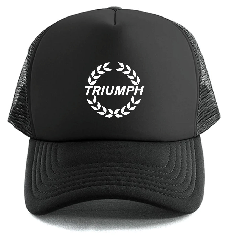 The Corsa Clothing Triumph Wreath Logo Hat is a black mesh trucker hat featuring "TRIUMPH" in white capitals with a laurel wreath design on the front panel.