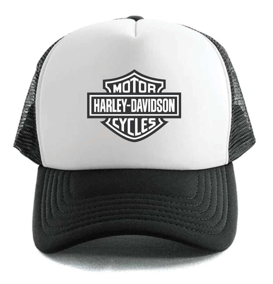 The Harley-Davidson Bar & Shield Hat White by Corsa Clothing is a black and white trucker hat with a mesh back, featuring the Harley-Davidson Motor Cycles logo on the front.