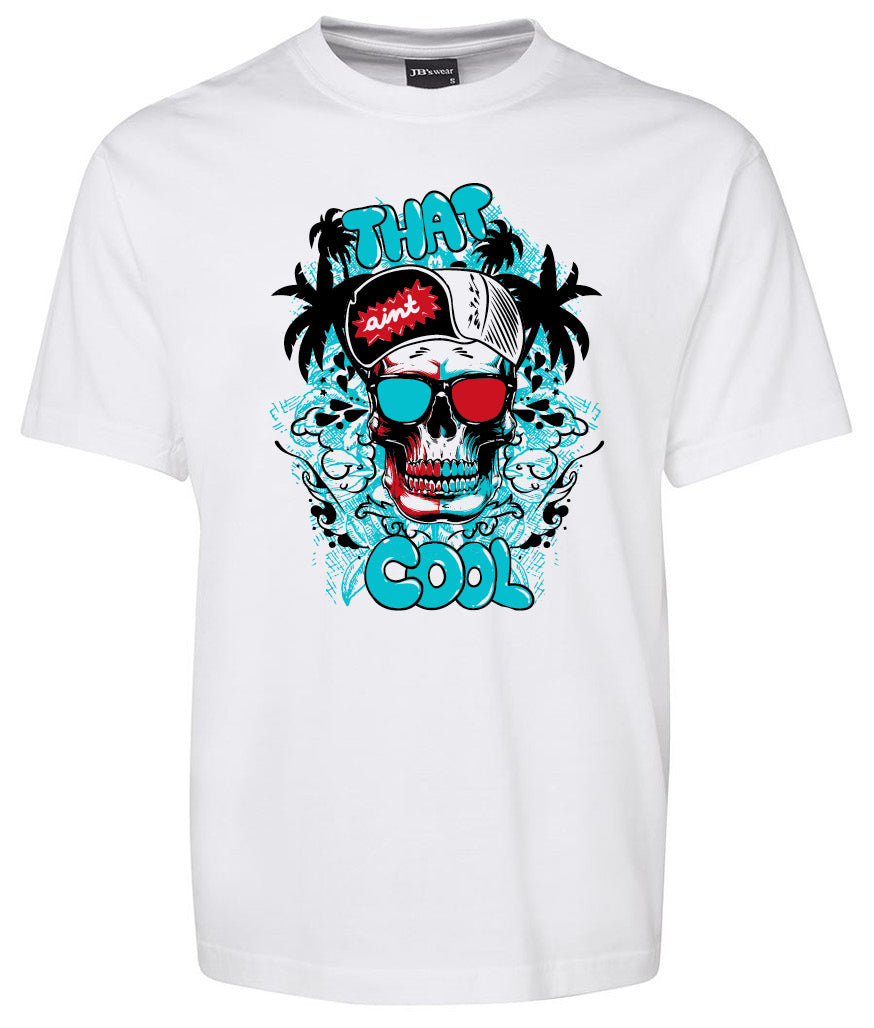 The That Cool Shirt by Corsa Clothing is a white tee with a vibrant skull graphic wearing red sunglasses and a cap, blue "THAT COOL" text, plus palm trees and ocean waves.