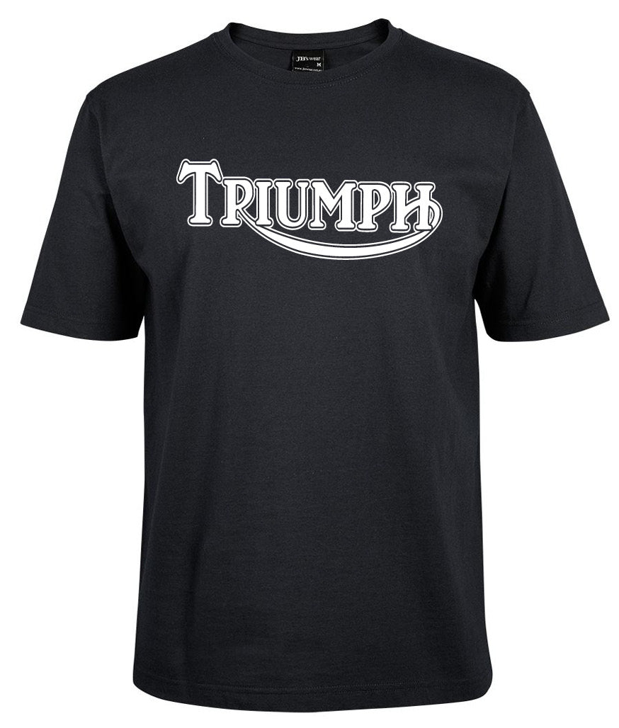 The Triumph Classic Logo Shirt by Corsa Clothing is a black T-shirt featuring "TRIUMPH" in bold, white, stylized letters across the chest.