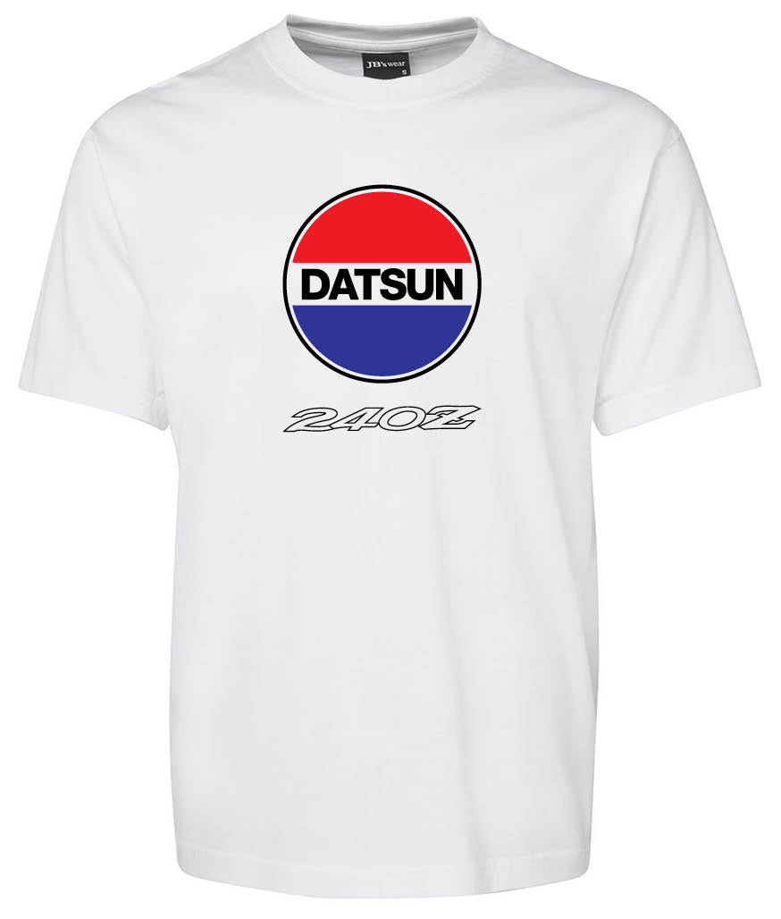 The DatSun 240Z Shirt by Corsa Clothing is a white T-shirt with a circular red, white, and blue logo featuring "DATSUN" in the center and "240Z" written in stylized text below.