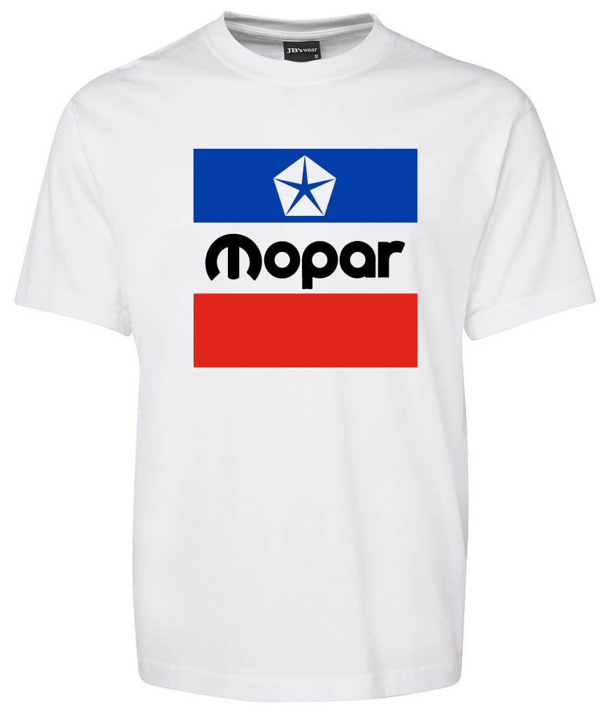 The Chrysler Mopar Classic Shirt by Corsa Clothing is a white t-shirt featuring a Mopar logo with a blue rectangle and white star outline above "Mopar" and a solid red rectangle below, centered on the chest.
