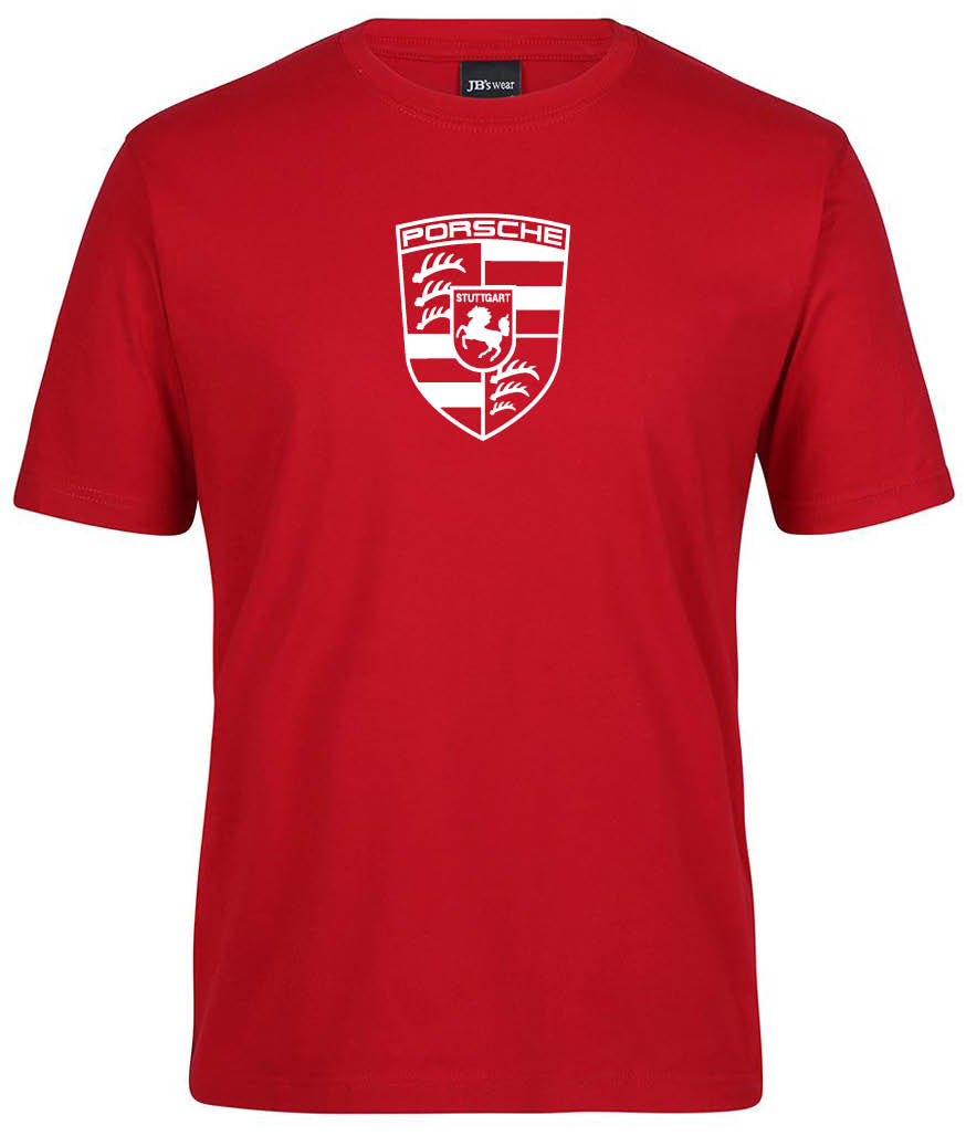 The Corsa Clothing Porsche Premium Shirt is a red short-sleeved tee featuring a white Porsche logo with horse and antlers emblem on the chest.