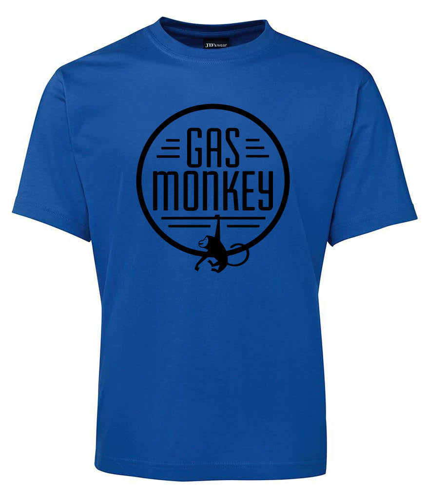 The Gas Monkey circle Shirt by Corsa Clothing is a blue tee with a black circular logo that reads GAS MONKEY and features a stylized monkey tail inside the circle.