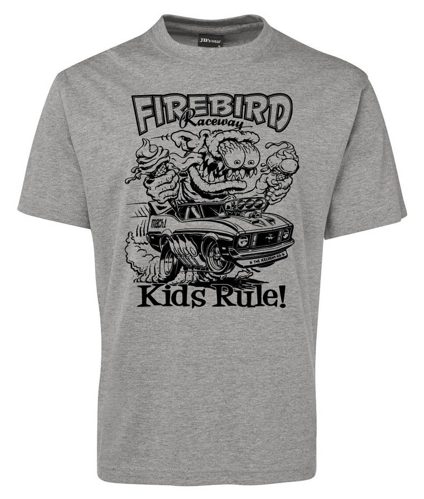 The Corsa Clothing FireBird Shirt features a gray tee with a cartoon pig racing a car, smoke rising from the tires. “FIREBIRD Raceway” appears above and “Kids Rule!” below in bold letters.