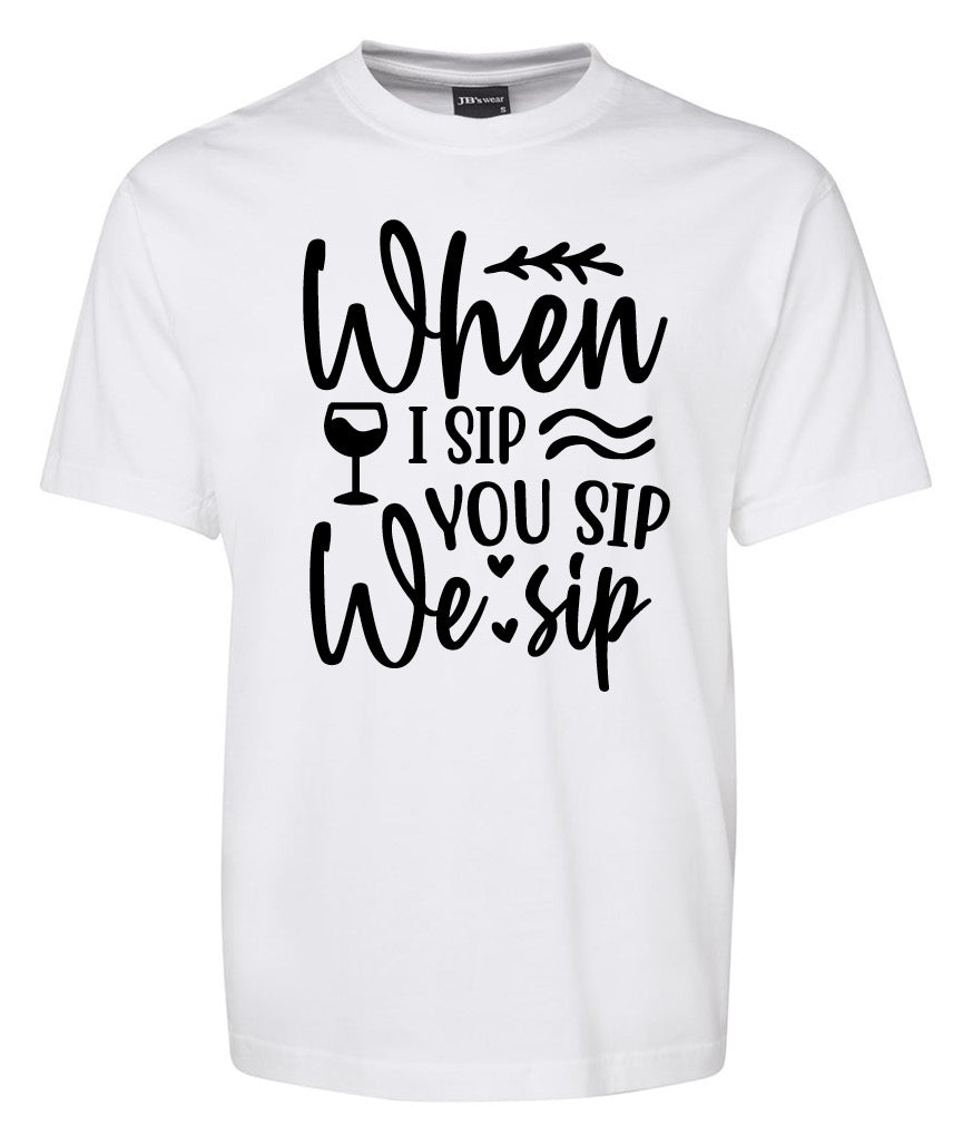 The Corsa Clothing “When i Sip you sip we sip Shirt” is a white tee with black text and graphics featuring a wine glass and wavy lines.