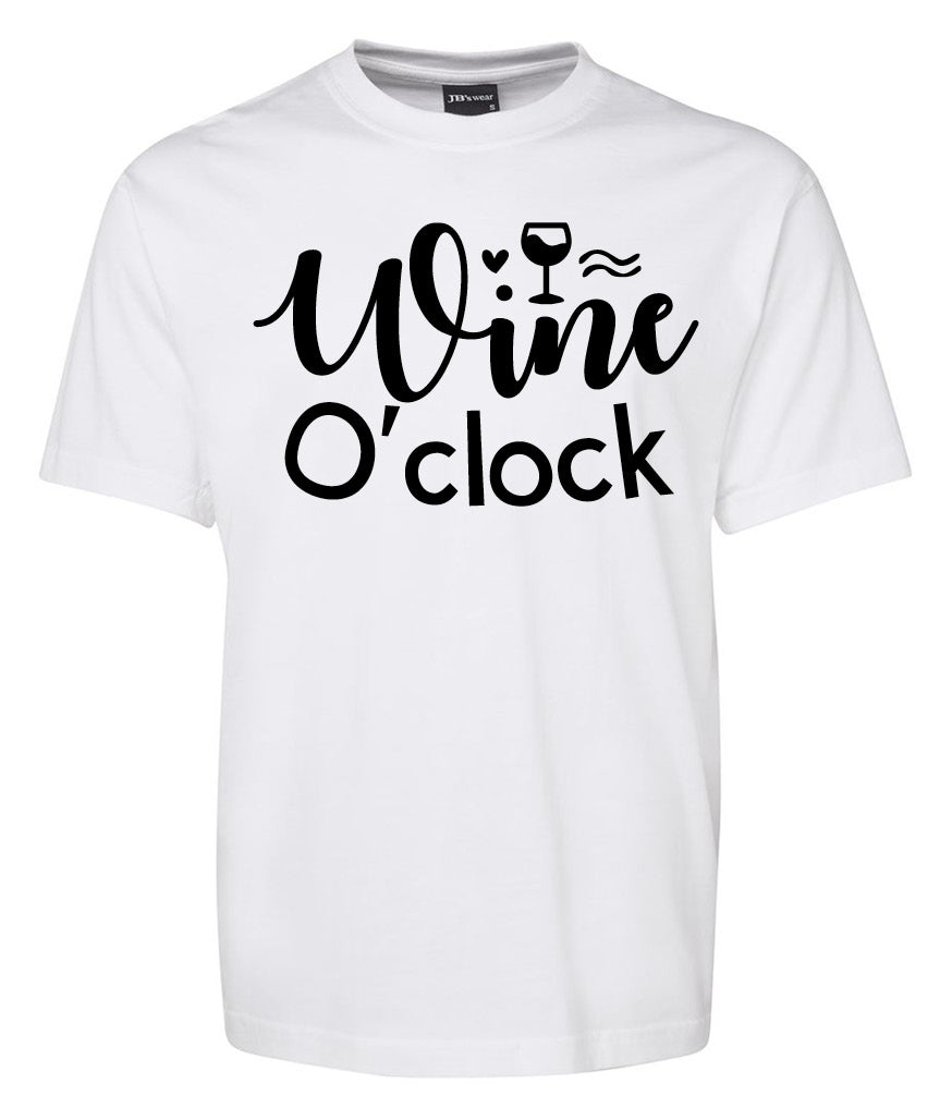 The Wine O'clock Shirt by Corsa Clothing is a white tee with "Wine O'clock" in black text and a wine glass illustration cleverly integrated into the word "Wine.
