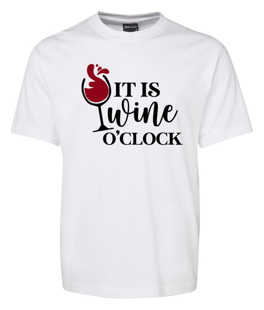 The "It is Wine O'clock Shirt" by Corsa Clothing is a white tee featuring “It is wine o’clock” in black, with “wine” styled so that a red wine glass forms the "w" and wine splashes accent the design.
