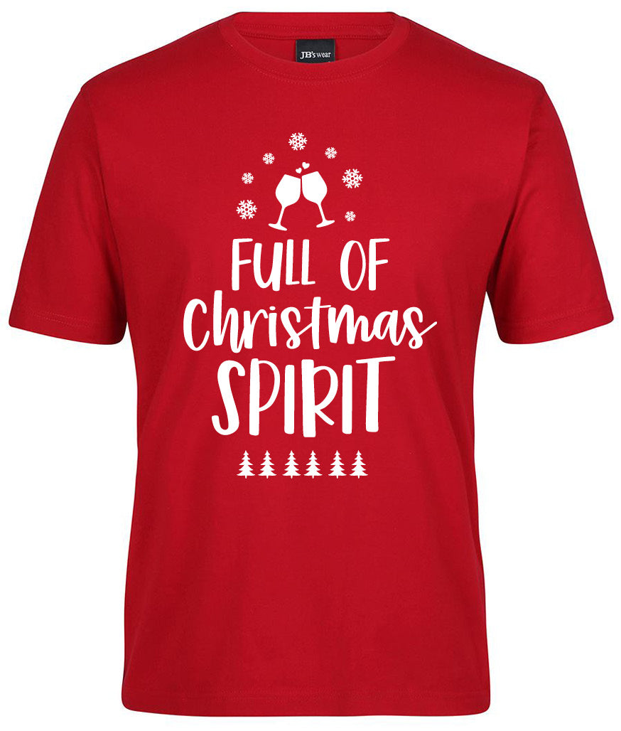 The Corsa Clothing "Full of Christmas Spirit Shirt" is a red tee featuring white text, snowflakes, two clinking glasses, and a row of small pine trees at the bottom.