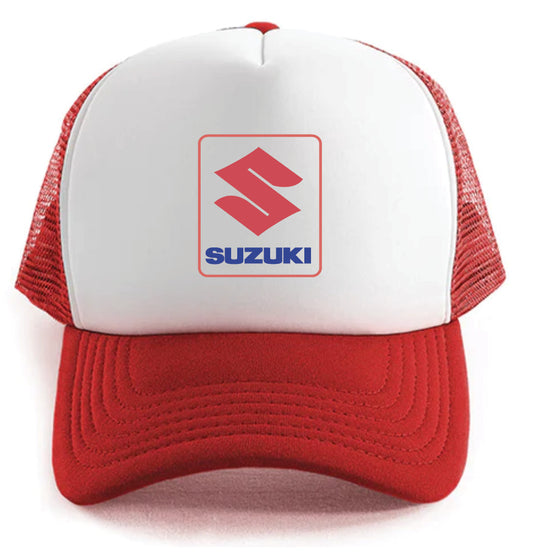 The Suzuki Hat by Corsa Clothing is a red and white trucker cap with a mesh back, showcasing the Suzuki logo and "SUZUKI" in blue on the front.