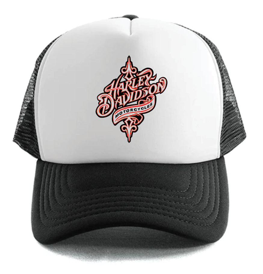 The Corsa Clothing Harley-Davidson Vinyl Hat is a black and white trucker cap with a mesh back, featuring ornate red and black Harley Davidson Motorcycles lettering on the front.