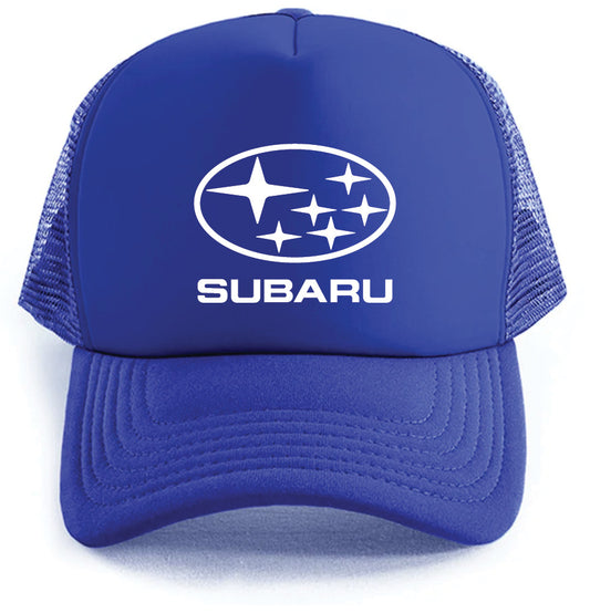 The Subaru Hat by Corsa Clothing is a blue trucker hat featuring the Subaru logo and SUBARU in white on the front, with a mesh back and curved brim.