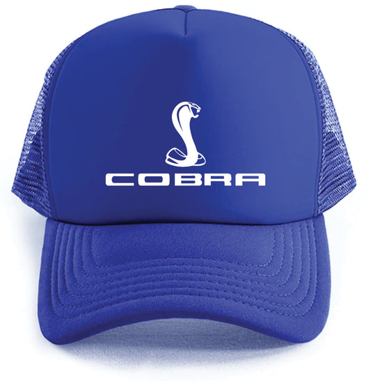 The Cobra Hat by Corsa Clothing is a blue cap featuring a white stylized cobra logo and "COBRA" on the front, with a mesh back and a solid curved brim.
