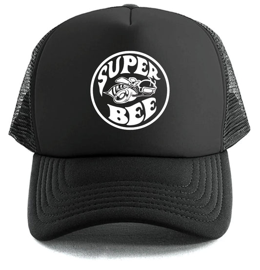 The Super Bee Hat by Corsa Clothing is a black mesh trucker hat with a round white logo featuring "SUPER BEE" and a helmeted, goggle-wearing bee riding a tire.