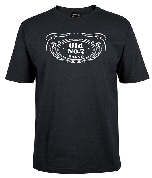 The Old NO.7 badge shirt by Corsa Clothing is a black tee with a white Old No. 7 Brand chest graphic, accented by decorative swirls and a wreath border.