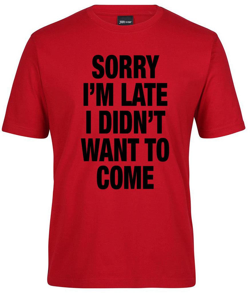 The Corsa Clothing "Sorry I'm Late I Didn't Want to Come Shirt" is a red tee featuring bold black text with the phrase printed on the front.