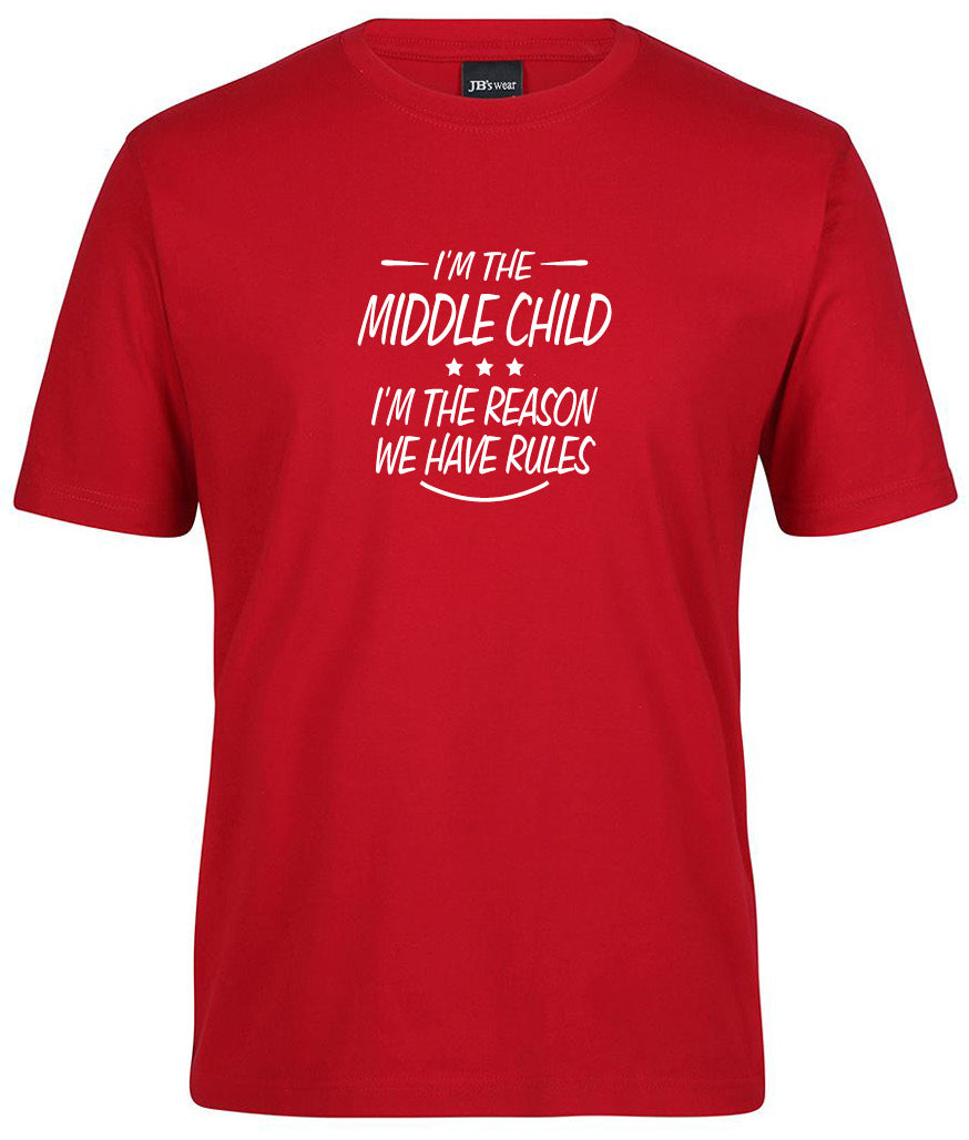 The Corsa Clothing Middle Child Shirt is a red tee with white text saying “I’m the middle child. I’m the reason we have rules,” plus three stars above the words.