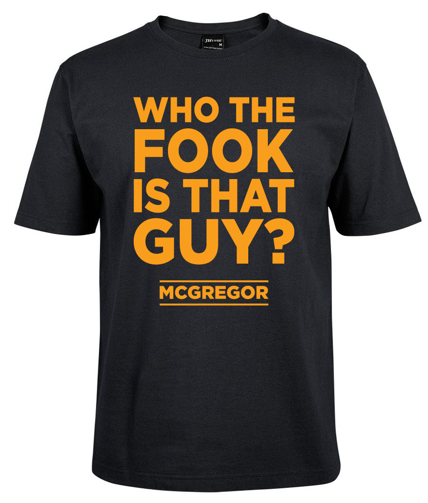 The Who is the Fook is that Guy T-shirt by Corsa Clothing features bold orange text on a black tee: WHO THE FOOK IS THAT GUY? MCGREGOR on the front.