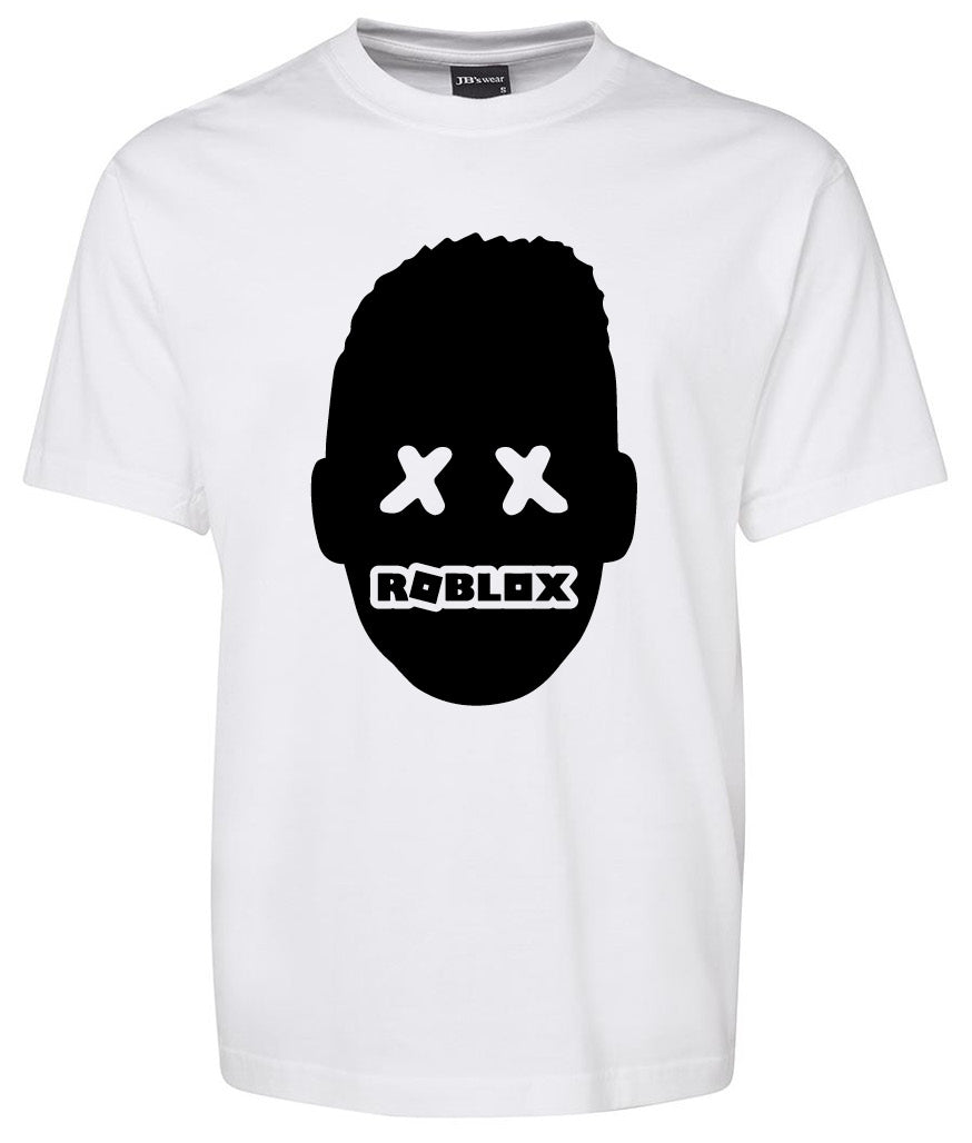 The Corsa Clothing ROBLOX Shirt is a white tee with a black head silhouette featuring Xs for eyes and "Roblox" over the mouth.