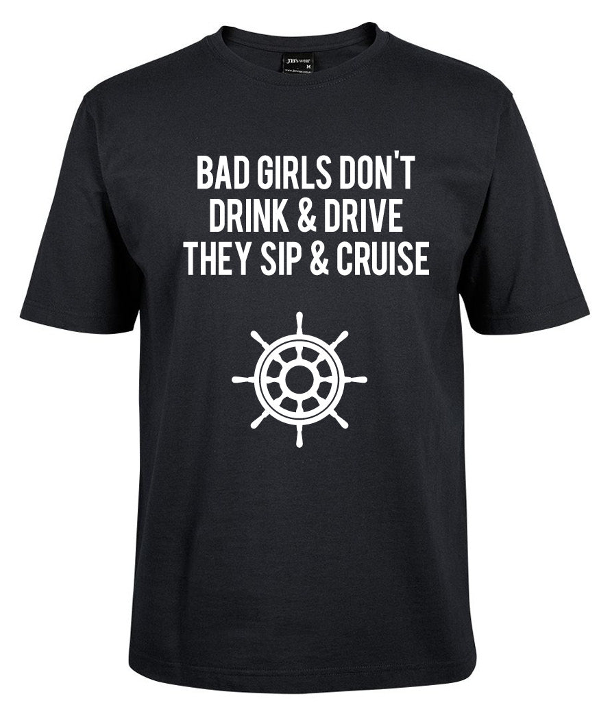 The BAD GIRLS DON'T DRINK & DRIVE THEY SIP & CRUISE Shirt by Corsa Clothing is a black tee featuring white text and a ship's wheel graphic.