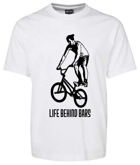 The Corsa Clothing Life Behind Bars BMX shirt is a white tee with a black graphic of a BMX rider and the phrase "LIFE BEHIND BARS" printed below.