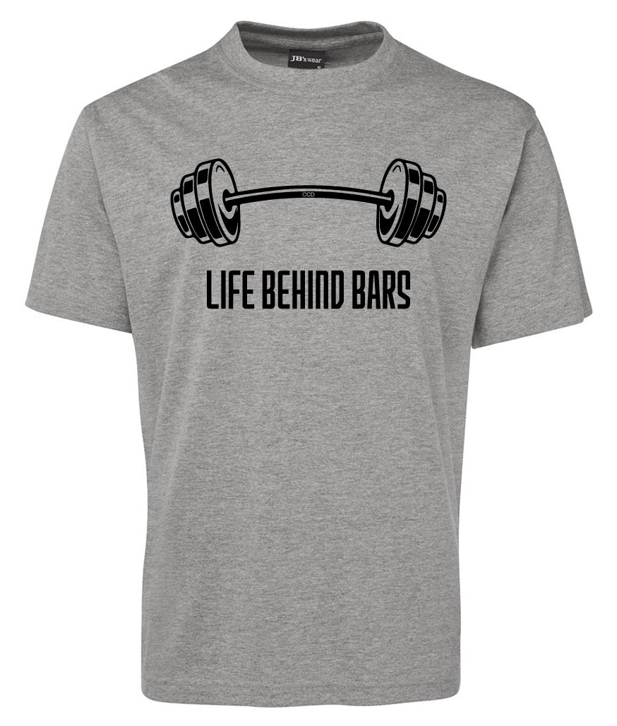 The Corsa Clothing Life Behind Bars Lifting Bar Shirt is a gray tee with a barbell graphic and "LIFE BEHIND BARS" printed in bold black letters below the image.