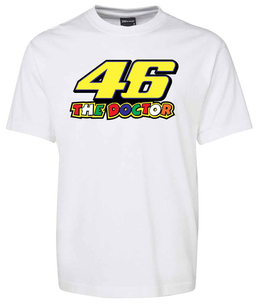 The Doctor Shirt by Corsa Clothing is a white tee with a large yellow number 46 above "THE DOCTOR" in bold, colorful letters on the front.