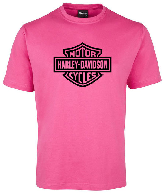 The HARLEY-DAVIDSON Bar Shield Shirt by Corsa Clothing is a bright pink short-sleeve tee with a bold black Harley-Davidson Motor Cycles logo on the chest.
