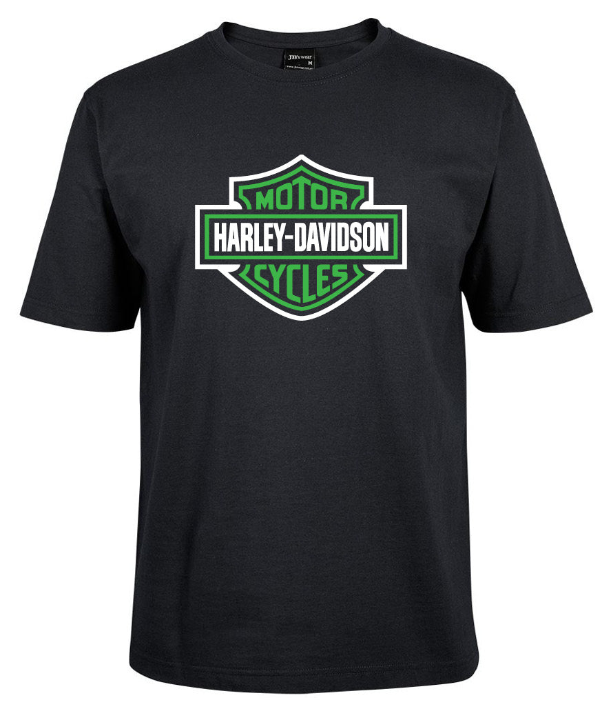 A black Corsa Clothing T-shirt with a green Harley-Davidson Bar & Shield logo, white border, on the chest.