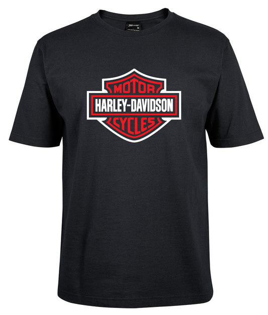 The Corsa Clothing Harley-Davidson Bar & Shield Shirt features the iconic logo in red with a white border on a black t-shirt, prominently displayed on the chest.