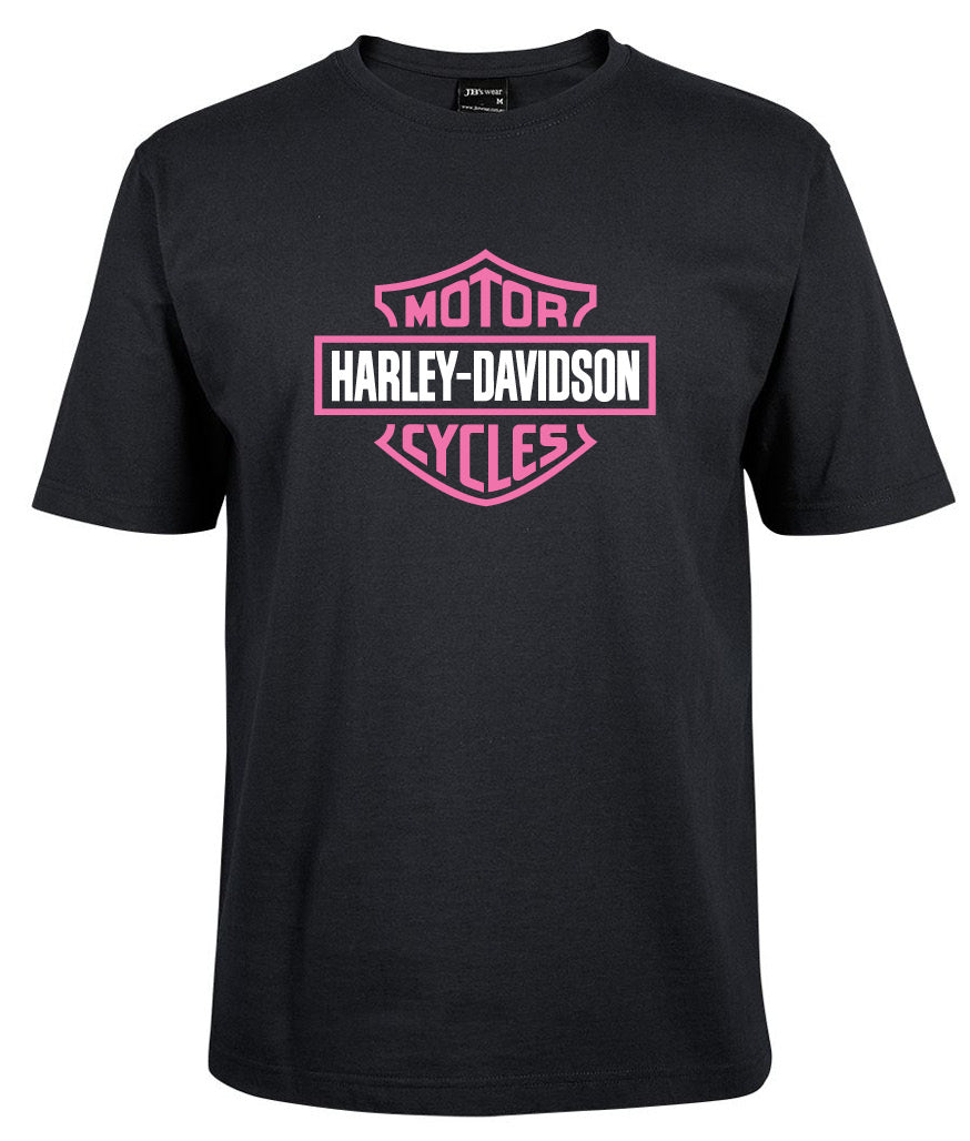 A purple Harley-Davidson Bar & Shield shirt by Corsa Clothing features the bold logo with "Motor" above and "Cycles" below "Harley-Davidson" on the front.