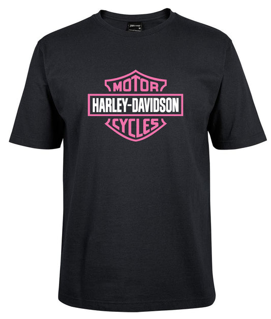 A purple Harley-Davidson Bar & Shield shirt by Corsa Clothing features the bold logo with "Motor" above and "Cycles" below "Harley-Davidson" on the front.