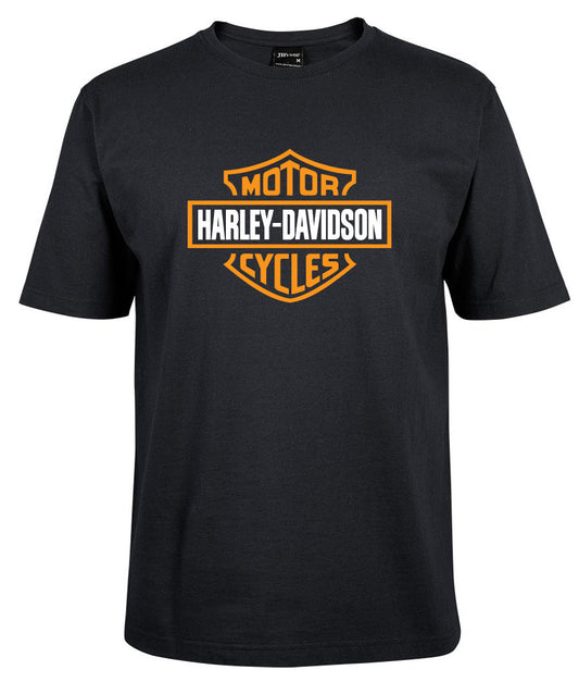 The Corsa Clothing Harley-Davidson Bar & Shield Shirt Orange is a black tee featuring the iconic orange and white Harley-Davidson logo with "Motor" above and "Cycles" below in bold text inside a shield on the chest.
