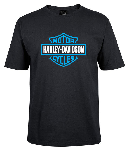 The Harley-Davidson Bar & Shield Shirt Blue by Corsa Clothing features a black tee with a blue and white, shield-shaped Harley-Davidson Motor Cycles logo boldly displayed on the front center.