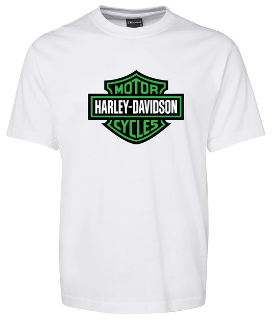 A white Corsa Clothing shirt featuring a green and black Harley-Davidson Bar & Shield logo on the chest.
