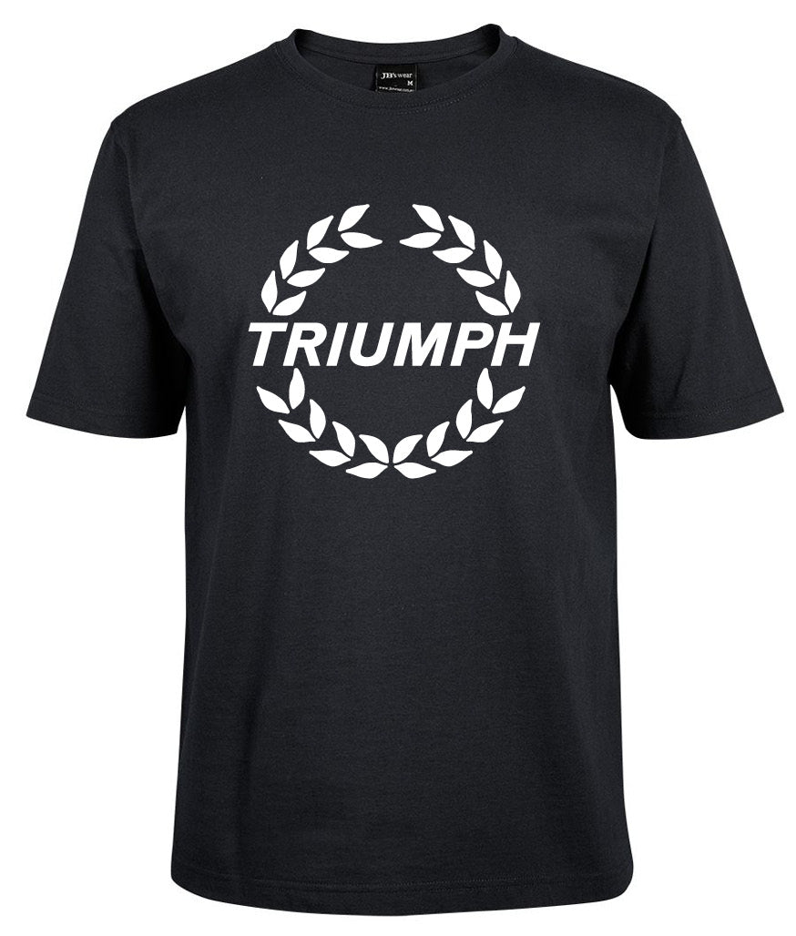 The Triumph Wreath Logo Shirt by Corsa Clothing features "TRIUMPH" in bold white letters with a laurel wreath design printed on the chest.