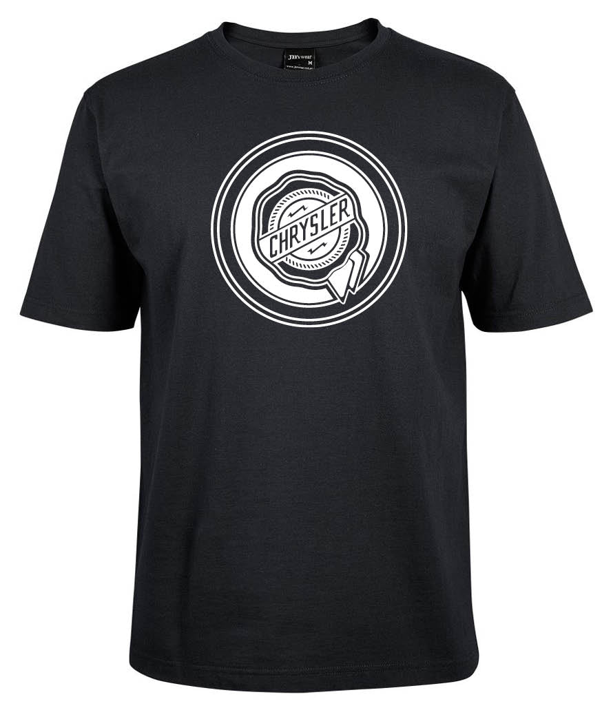 The Corsa Clothing CHRYSLER Shirt is a black tee with a white circular Chrysler logo, featuring stylized text and a geometric border at the center chest. No other graphics or text appear on the shirt.