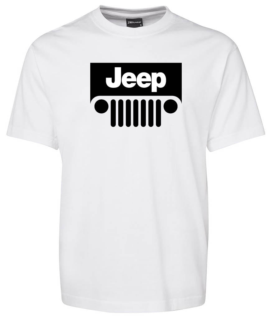The Jeep Shirt by Corsa Clothing is a white T-shirt featuring a bold black Jeep logo with the word "Jeep" above a stylized front grille and headlights graphic on the chest.