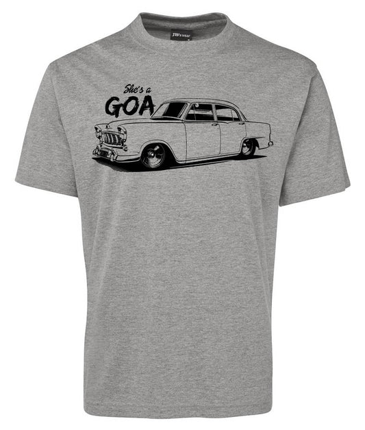 The She's GOA Shirt by Corsa Clothing is a gray tee with a black and white vintage car illustration and the phrase "She's a GOA" above the car on the chest.