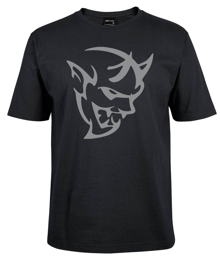 The Dodge Demon Shirt by Corsa Clothing is a black tee with a bold, stylized gray devil head featuring sharp features, pointed ears, and horns printed on the front center.