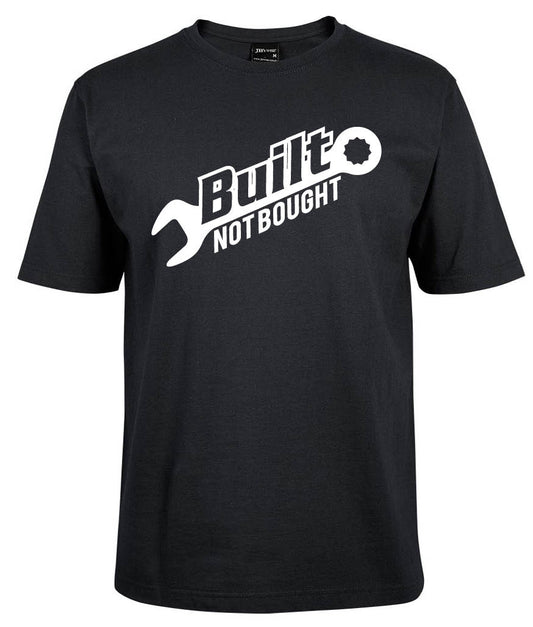 The Built Shirt by Corsa Clothing is a black tee featuring "Built Not Bought" in white, with a wrench graphic forming the letter B in "Built.