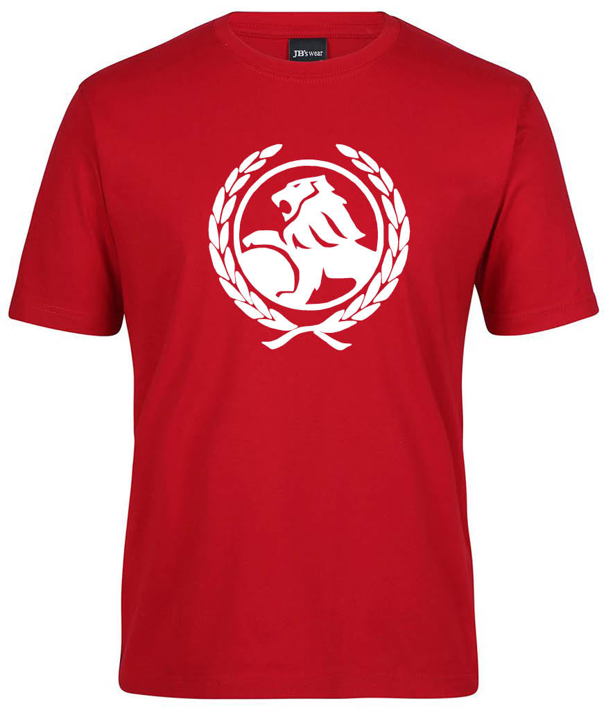 The Corsa Clothing Loin Badge Shirt is a red tee with a white lion graphic inside a laurel wreath on the front.