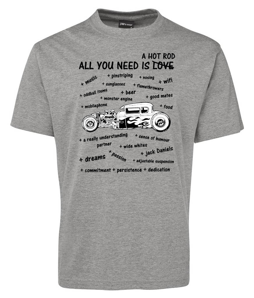 The All You Need Classic Shirt by Corsa Clothing is a gray tee with a black hot rod graphic and the phrase "A HOT ROD ALL YOU NEED IS LOVE," plus fun words like beer, music, and wifi scattered throughout the design.