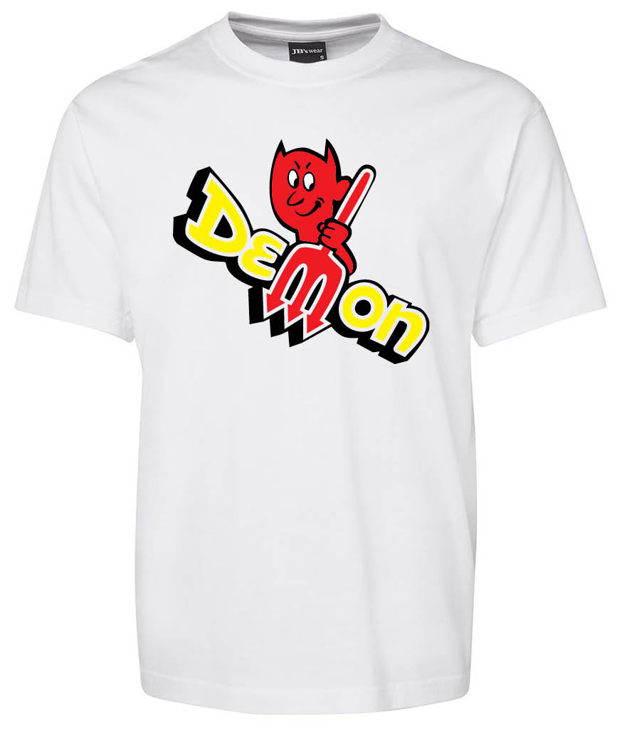The Demon Shirt White by Corsa Clothing features a cartoon red devil with a pitchfork and bold yellow, black, and white "Demon" lettering on a classic white tee.