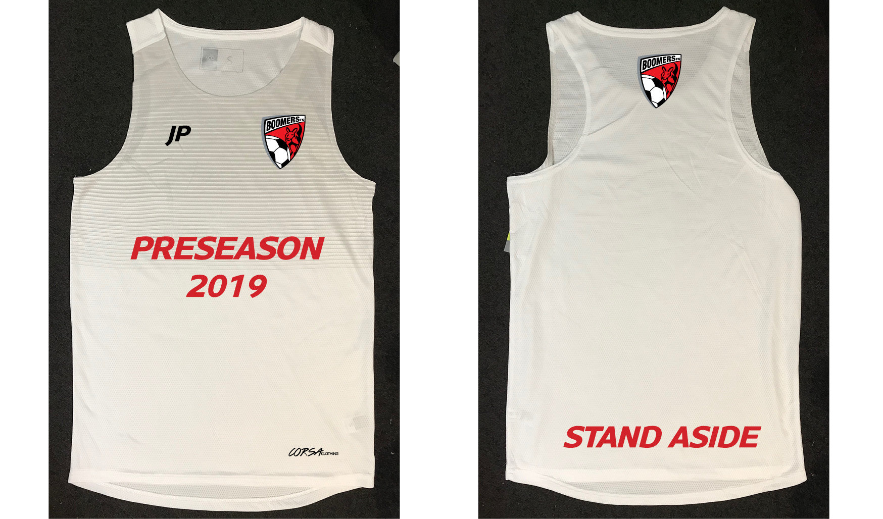 Two views of the Corsa Clothing PRESEASON 2019 Jersey, a white sports singlet. The front features a red and black logo, JP initials, and "PRESEASON 2019" in red; the back shows the logo with "STAND ASIDE" in red at the bottom.