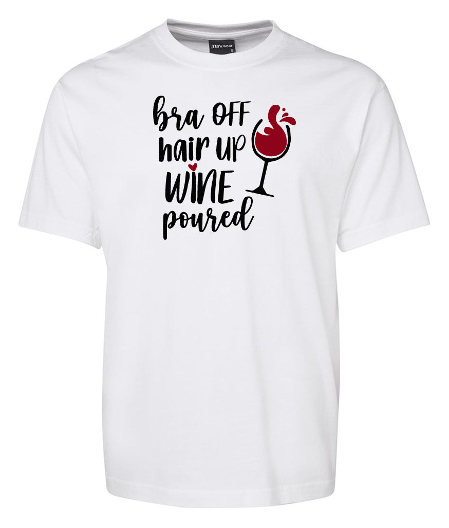 The Corsa Clothing "Bra off hair up WinE poured Shirt" is a white tee with black and red text and a graphic of a wine glass filled with red wine.