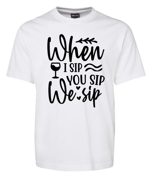 The Corsa Clothing “When i Sip you sip we sip Shirt” is a white tee with black text and graphics featuring a wine glass and wavy lines.