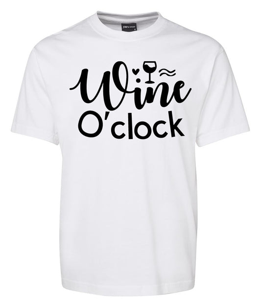 The Wine O'clock Shirt by Corsa Clothing is a white tee with "Wine O'clock" in black text and a wine glass illustration cleverly integrated into the word "Wine.