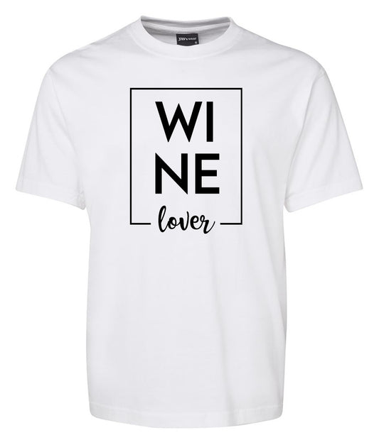 The Wine Lover Shirt by Corsa Clothing features "WINE" in bold black letters split across two lines, with "lover" in cursive font below, printed on a white T-shirt.