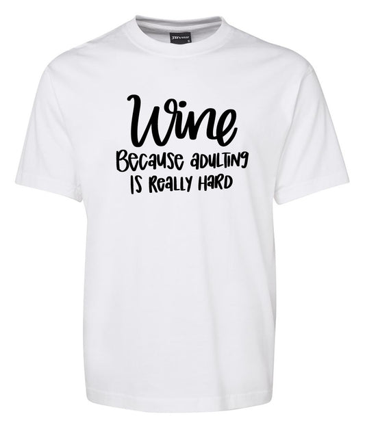 The Corsa Clothing Wine becaus adulting is reallu hard Shirt is a white tee featuring the slogan in bold black letters on the front.